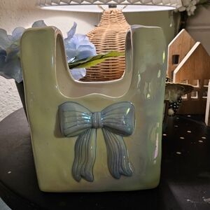 Elegant Ceramic Vase with Blue Bow